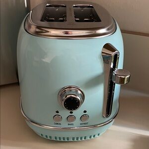 Retro Turquoise Toaster with Chrome Accents